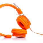 Compelling content with orange headphones - radio
